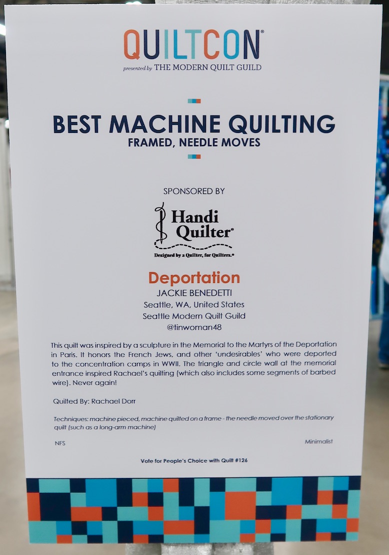 "Deportation" by Jackie Benedetti, quilted by Rachael Dorr - Sign